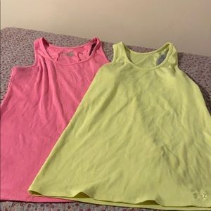 2 Under Armour tank tops.
